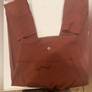 Rust color lululemon leggings size 2, length 28.
